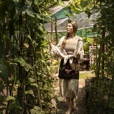 full shot woman walking with bas